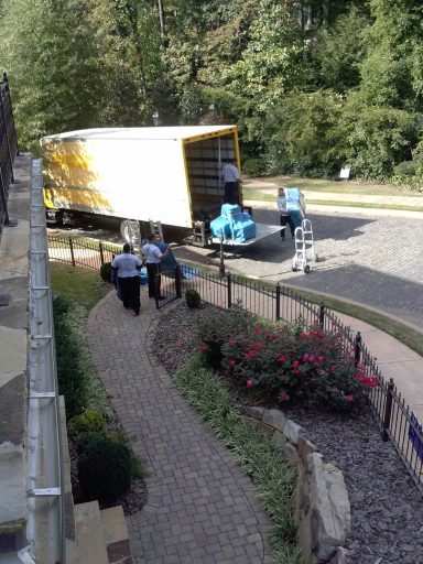 precision moving skills, with professionaly wrapped furniture