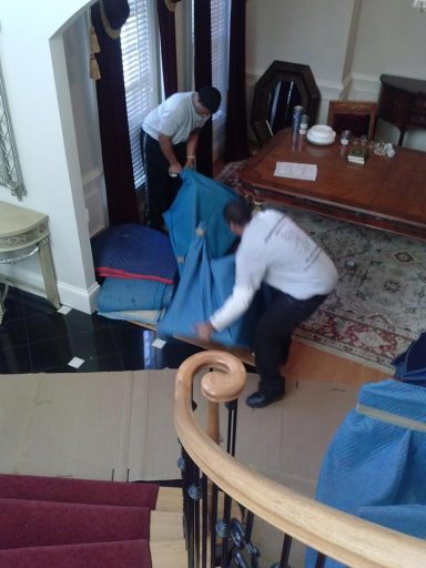 professional movers safeguarding home and furniture from damages