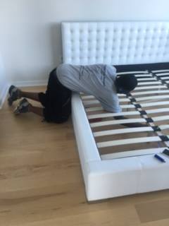 Mover assembling a bed